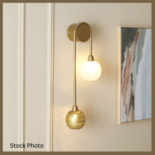 Amari Wall Sconce – Elegant Antique Gold Accent by Safavieh